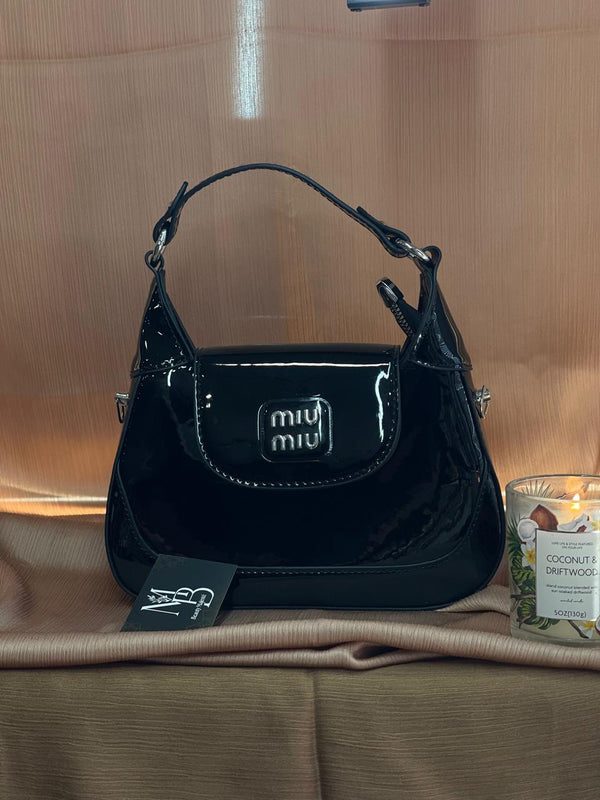 شنط miu miu